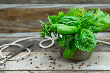Bunch of garden herbs on wooden table