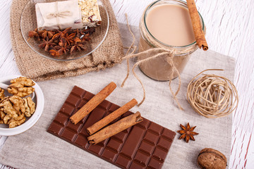 brown detox coctail with cinnamon sticks,walnuts and chocolate l