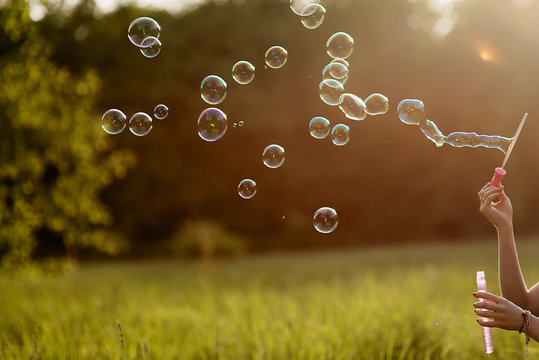 Side View Shot Blowing Soap Bubbles