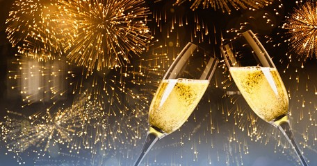 Composite image of champagne glasses clinking © vectorfusionart