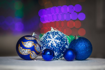 Blue christmas balls with bokeh background. New Year decoration.