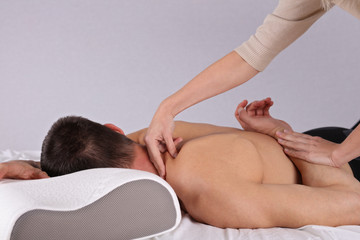 Man having sport massage. Acupressure, Chiropractic, osteopathy, concept .