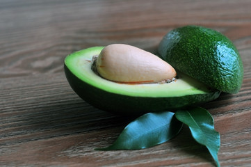 Close-up of an avocado with leaves