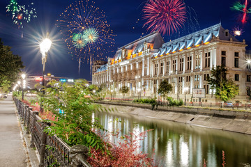 Center of Bucharest with fireworks in the sky. - obrazy, fototapety, plakaty