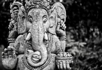 Black-white photo of ancient sculpture.