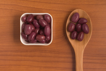Black olives into a bowl
