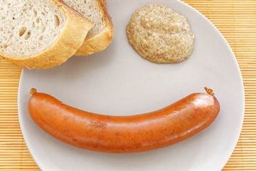 tasty sausages with bread and mustard