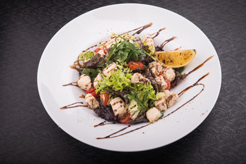 tasty caesar salad on white plate