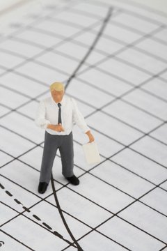 miniatura di insegnante su grafico