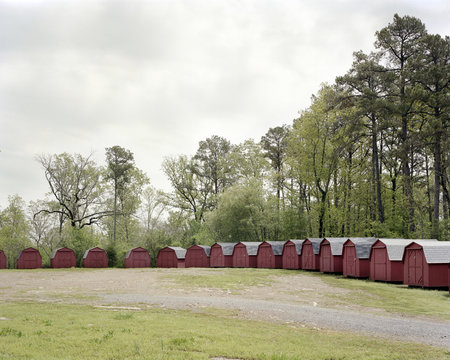 Sheds placed together in a lot in Clinton, Arkansas.