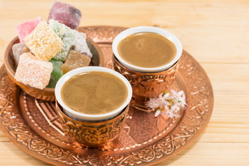 Coffee and Turkish delight in a copper cups