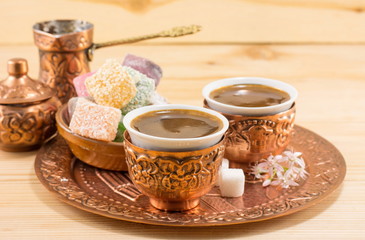 Coffee and Turkish delight in a copper cups