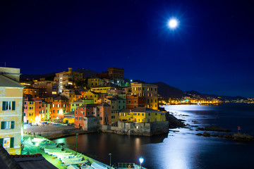 GENOA, ITALY NOVEMBER 14, 2016 - Genoa Boccadasse by night while watching the large moon of...