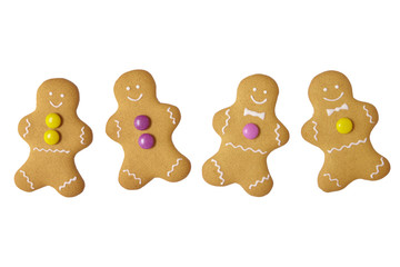 Assorted hand decorated gingerbread men isolated on a white background