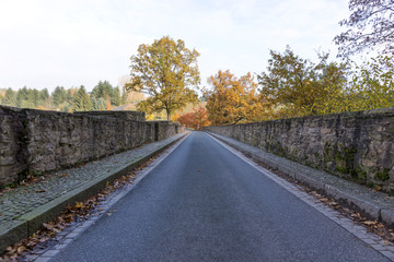 Old small stone bridge over the river