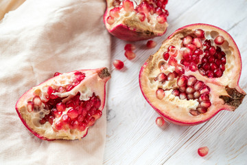 Sliced pomegranate on white background