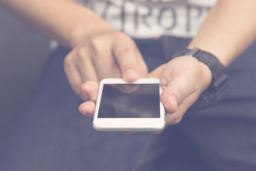 young man using smartphone black screen