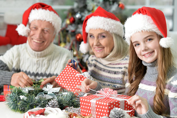 Family with Christmas presents