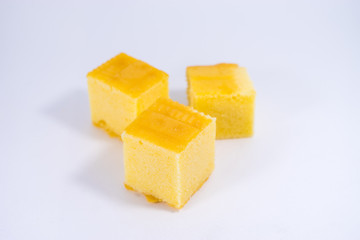 square butter cake on white background. square butter cake stack. butter cake on white.
