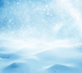
Christmas winter background with snow and blurred bokeh
