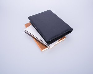 notebook or black leather notebook on the blackground.