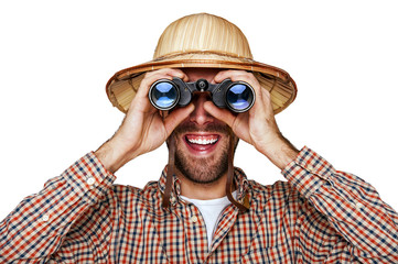 Man looking binoculars with traveler hat isolated over white bac