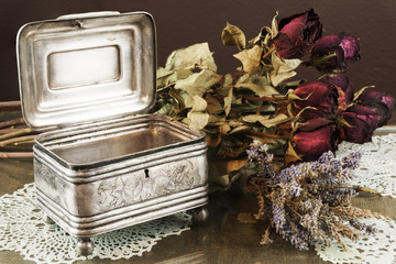 Silver casket, jewelry/trinket box with dry roses and lavender