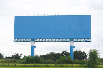 Billboards Space Blue Outdoors in the middle of green fields. © kunpisit