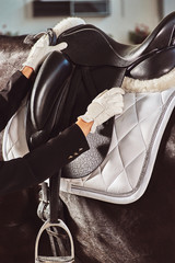 woman jockey with his horse