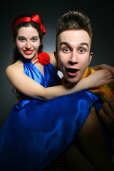 Naklejka premium dudes in bright clothes, guy with a girl in a bright dress 60s