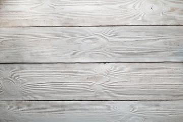 Vintage weathered shabby white painted wood texture as background. Background texture of old white painted wooden lining boards wall. Wood Texture.