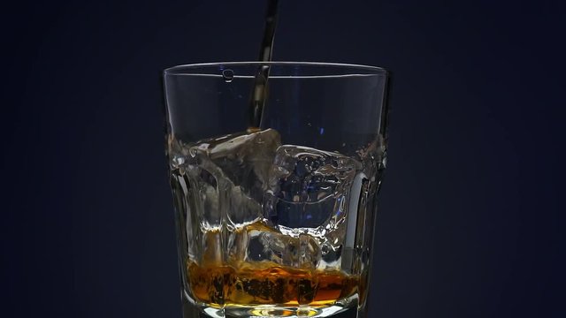 Whiskey pour in slow motion