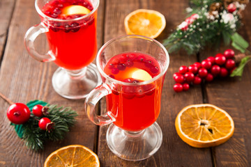 Christmas card. hot spicy Christmas drink of cranberry and spice
