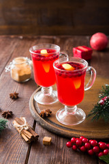 Christmas card. hot spicy Christmas drink of cranberry and spice