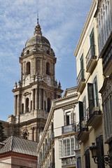 Fototapeta premium Top of the church in Granada in southern Spain as a typical Spanish bell tower, symbol of Spanish religious architecture and design 