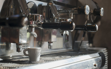 Making coffee on professional coffee machine