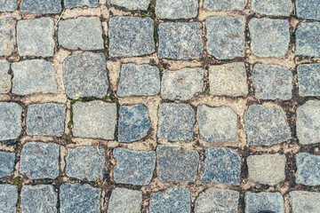 Floor with irregular cobblestone blocks seen from top