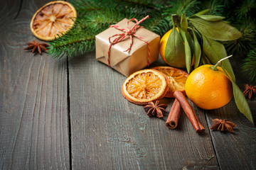 Christmas decoration with gift box and mandarines