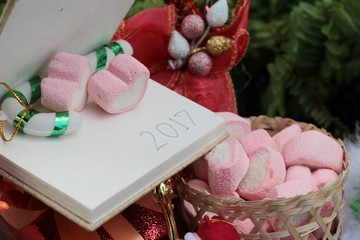 Celebrate Christmas decoration with pink heart marshmallow.
