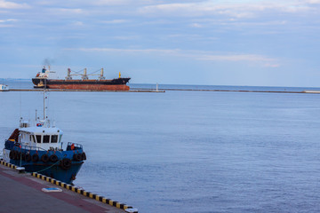 sea port landscape with tow boat 