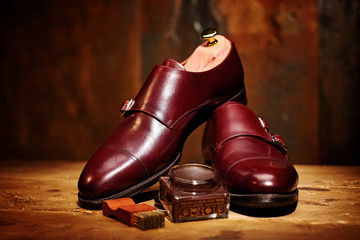 Still life with men's leather shoes and accessories for shoes ca