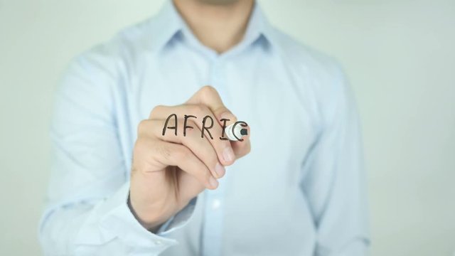 African, Man Writing on Screen