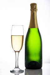 Champagne bottle and  cup on white background
