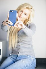 Naklejka premium Beautiful woman posing for a self portrait