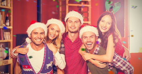 Composite image of portrait of men with christmas wearing giving