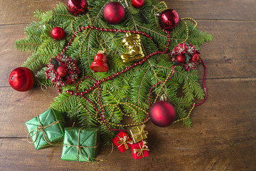 Fototapeta na wymiar Christmas decorations on vintage wooden background. top view