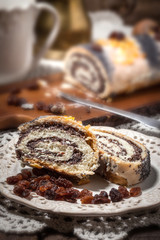 Pieces of poppy seed cake on a plate.