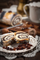 Pieces of poppy seed cake on a plate.