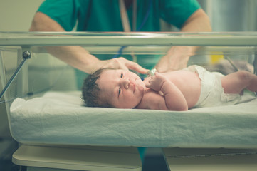 Obraz na płótnie Canvas Newborn baby in hospital