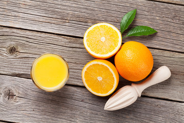 Fresh ripe oranges and juice